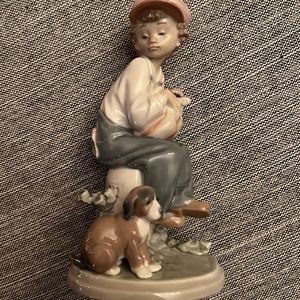 LLADRO BOY WITH DOG FIGURINE